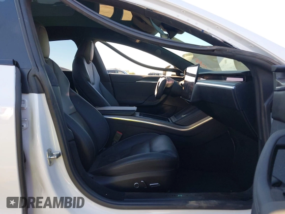 2022 Tesla Model S Plaid with VIN 5YJSA1E64NF479959, listed as a IAAI auction lot 41057673 with 27,203 mi miles and . Bid and sale history available at DreamBid. Image 5.