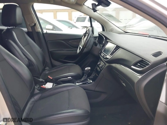 2020 Buick Encore Preferred with VIN KL4CJASBXLB003053, listed as a IAAI auction lot 41688903 with 121,572 mi miles. Bid and sale history available at carsss.com. Image 5.