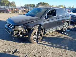 2018 Volkswagen Tiguan SEL with VIN 3VV3B7AX7JM117053, listed as a IAAI auction lot 40827695 with 71,489 mi miles and . Bid and sale history available at DreamBid. Image 2.