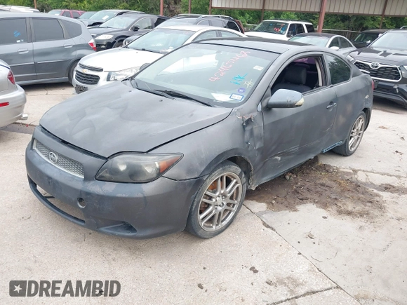 2006 Scion tC z VIN JTKDE177760091894, wystawiony jako IAAI lot #42465468 z przebiegiem 240 821 mil mil oraz . Historia ofert i sprzedaży dostępna na DreamBid. Obrazek 2.