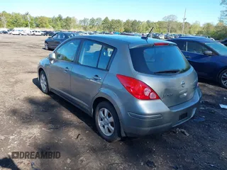 2012 Nissan Versa S with VIN 3N1BC1CP2CK804329, listed as a IAAI auction lot 39366678 with 167,539 mi miles. Bid and sale history available at carsss.com. Image 3.