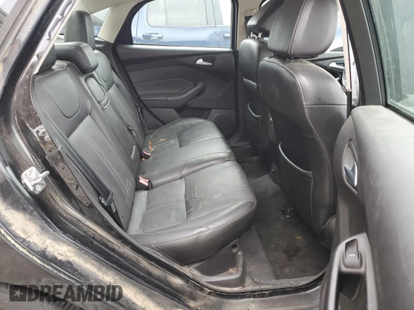2013 Ford Focus SE z VIN 1FADP3F24DL216824, wystawiony jako Copart lot #52142715 z przebiegiem 149 611 mil mil oraz Szkoda całkowita • Salvage title. Historia ofert i sprzedaży dostępna na DreamBid. Obrazek 10.