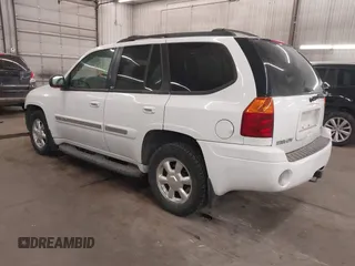 2003 GMC Envoy SLT with VIN 1GKDT13S332222847, listed as a IAAI auction lot 41771052 with 203,699 mi miles. Bid and sale history available at carsss.com. Image 3.