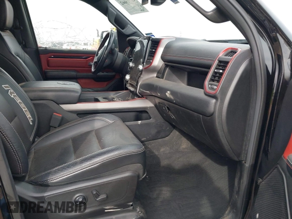 2020 Ram 1500 Rebel with VIN 1C6SRFLT5LN113514, listed as a IAAI auction lot 41718662 with 56,730 mi miles and . Bid and sale history available at DreamBid. Image 5.