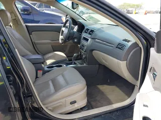 2010 Ford Fusion SEL with VIN 3FAHP0JA9AR421938, listed as a IAAI auction lot 42086265 with 158,388 mi miles. Bid and sale history available at carsss.com. Image 5.