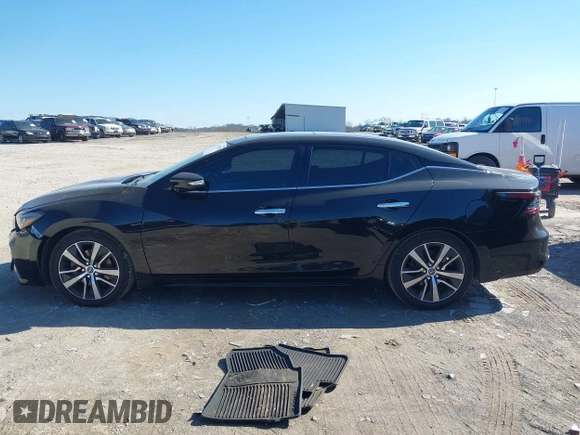 2019 Nissan Maxima Platinum z VIN 1N4AA6AV0KC365901, wystawiony jako IAAI lot #41473793 z przebiegiem 137 772 mil mil oraz . Historia ofert i sprzedaży dostępna na DreamBid. Obrazek 14.