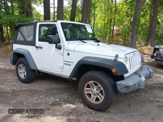 2012 Jeep Wrangler Sport with VIN 1C4AJWAG7CL192200, listed as a IAAI auction lot 42472398 with 198,999 mi miles and . Bid and sale history available at DreamBid. Image 1.