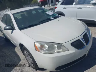 2006 Pontiac G6 6-Cyl z VIN 1G2ZG558264213214, wystawiony jako IAAI lot #42044349 z przebiegiem 138 725 mil mil oraz . Historia ofert i sprzedaży dostępna na DreamBid. Obrazek 1.