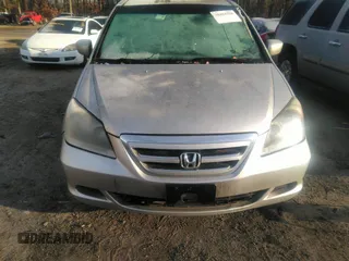2006 Honda Odyssey EX-L with VIN 5FNRL38616B413712, listed as a IAAI auction lot 39878116 with 228,623 mi miles. Bid and sale history available at carsss.com. Image 6.