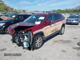 2015 Jeep Cherokee Latitude with VIN 1C4PJLCB0FW643402, listed as a IAAI auction lot 41811328 with 110,232 mi miles and . Bid and sale history available at DreamBid. Image 2.