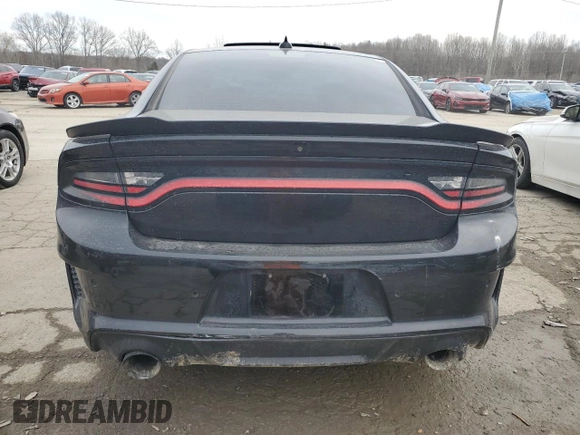 2021 Dodge Charger Scat Pack with VIN 2C3CDXGJ7MH584590, listed as a Copart auction lot 46396325 with 51,257 mi miles and Salvage Title. Bid and sale history available at DreamBid. Image 6.