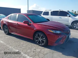 2018 Toyota Camry LE z VIN 4T1B11HK4JU658217, wystawiony jako IAAI lot #42261589 z przebiegiem 115 095 mil mil oraz . Historia ofert i sprzedaży dostępna na DreamBid. Obrazek 1.