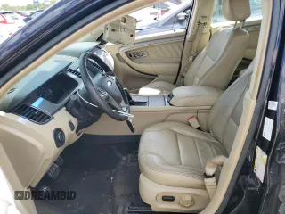2016 Ford Taurus SEL z VIN 1FAHP2E9XGG117710, wystawiony jako Copart lot #57914095 z przebiegiem 131 344 mil mil oraz Szkoda całkowita • Salvage title. Historia ofert i sprzedaży dostępna na DreamBid. Obrazek 7.