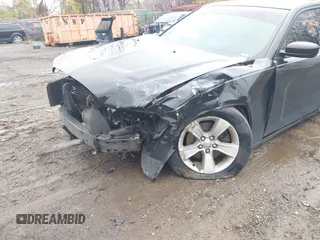 2014 Dodge Charger SE with VIN 2C3CDXBG4EH210130, listed as a IAAI auction lot 40908216 with Not Provided miles and . Bid and sale history available at DreamBid. Image 6.