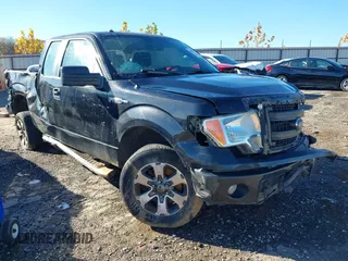 2014 Ford F-150 XL with VIN 1FTFX1CF0EFD04042, listed as a IAAI auction lot 40848373 with 164,631 mi miles. Bid and sale history available at carsss.com. Image 1.