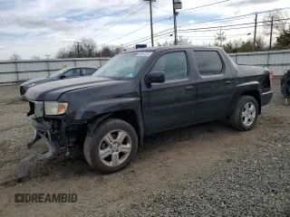 2010 Honda Ridgeline RTL with VIN 5FPYK1F57AB010749, listed as a Copart auction lot 45884225 with 165,016 mi miles and Salvage Title. Bid and sale history available at carsss.com. Image 1.