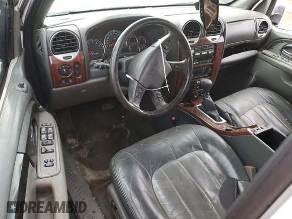 2004 GMC Envoy SLT with VIN 1GKDT13S442158660, listed as a Copart auction lot 50190045 with 0 mi miles and Salvage Title. Bid and sale history available at carsss.com. Image 8.