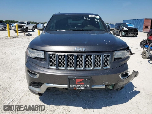 2014 Jeep Grand Cherokee Summit with VIN 1C4RJFJGXEC159438, listed as a Copart auction lot 50864595 with 134,558 mi miles and Salvage title. Bid and sale history available at DreamBid. Image 5.
