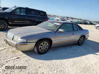 1996 Cadillac Eldorado z VIN 1G6EL12Y6TU613813, wystawiony jako Copart lot #78274114 z przebiegiem Nie podano mil oraz Szkoda całkowita • Salvage title. Historia ofert i sprzedaży dostępna na DreamBid. Obrazek 1.