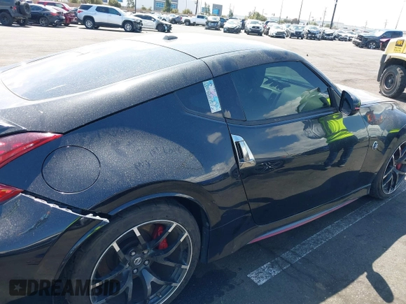 2019 Nissan 370Z Sport Touring with VIN JN1AZ4EH4KM420441, listed as a IAAI auction lot 41937742 with 80,784 mi miles and . Bid and sale history available at DreamBid. Image 14.