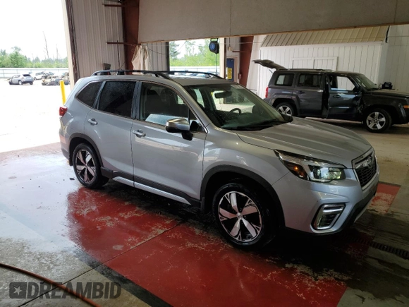 2021 Subaru Forester Touring with VIN JF2SKAXC8MH461092, listed as a Copart auction lot 63675875 with 26,720 mi miles and Salvage title. Bid and sale history available at DreamBid. Image 4.