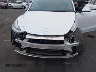 2023 Tesla Model Y Long Range z VIN 7SAYGDEE5PA063097, wystawiony jako IAAI lot #42171871 z przebiegiem Nie podano mil oraz . Historia ofert i sprzedaży dostępna na DreamBid. Obrazek 10.