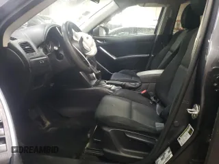 2014 Mazda CX-5 Sport z VIN JM3KE4BE2E0371864, wystawiony jako Copart lot #47225335 z przebiegiem 157 483 mil mil oraz Szkoda całkowita • Salvage title. Historia ofert i sprzedaży dostępna na DreamBid. Obrazek 7.