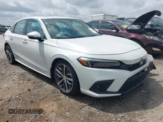2023 Honda Civic Touring z VIN 2HGFE1F98PH323369, wystawiony jako IAAI lot #41942499 z przebiegiem 21 813 mil mil oraz . Historia ofert i sprzedaży dostępna na DreamBid. Obrazek 1.