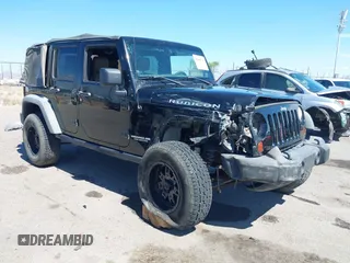 2011 Jeep Wrangler Unlimited Rubicon with VIN 1J4HA6H11BL641492, listed as a IAAI auction lot 42402713 with 112,156 mi miles and . Bid and sale history available at DreamBid. Image 1.