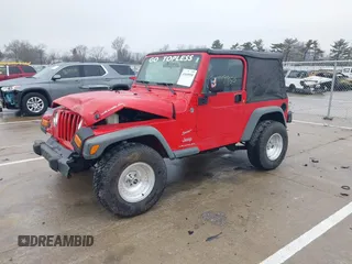 2006 Jeep Wrangler SE with VIN 1J4FA29156P762295, listed as a IAAI auction lot 41669950 with 163,492 mi miles and . Bid and sale history available at DreamBid. Image 2.