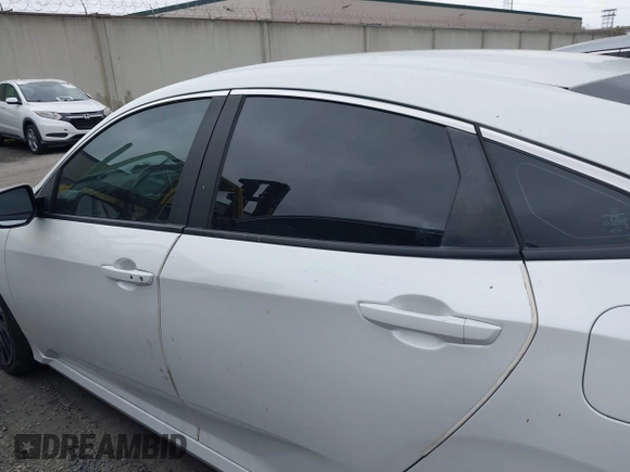 2019 Honda Civic Sport with VIN 2HGFC2F85KH512587, listed as a IAAI auction lot 41708347 with 63,895 mi miles and . Bid and sale history available at DreamBid. Image 14.