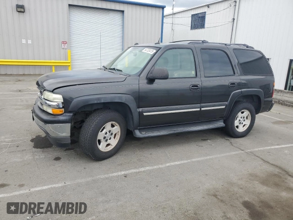 2005 Chevrolet Tahoe Z71 with VIN 1GNEC13T85R141076, listed as a Copart auction lot 54733415 with 310,992 mi miles and Salvage title. Bid and sale history available at DreamBid. Image 1.