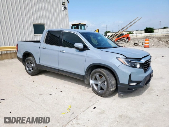 2023 Honda Ridgeline RTL-E with VIN 5FPYK3F76PB036572, listed as a Copart auction lot 54717085 with 34,516 mi miles and Salvage title. Bid and sale history available at DreamBid. Image 4.