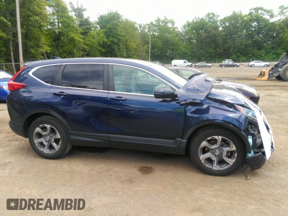 2019 Honda CR-V EX z VIN 7FARW1H51KE022321, wystawiony jako IAAI lot #42311602 z przebiegiem 58 776 mil mil oraz . Historia ofert i sprzedaży dostępna na DreamBid. Obrazek 13.