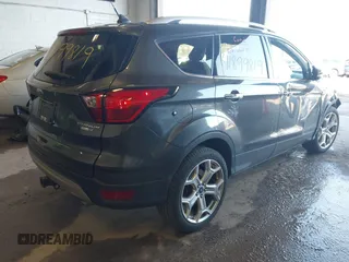 2019 Ford Escape Titanium with VIN 1FMCU9J95KUA19816, listed as a IAAI auction lot 41899819 with 71,760 mi miles and . Bid and sale history available at DreamBid. Image 4.