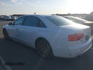 2013 Audi A8 3.0L z VIN WAURGAFD5DN009804, wystawiony jako IAAI lot #42642523 z przebiegiem 141 252 mil mil oraz . Historia ofert i sprzedaży dostępna na DreamBid. Obrazek 14.