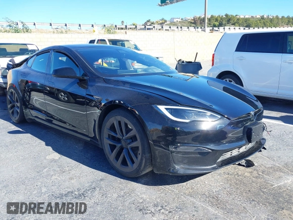 2022 Tesla Model S with VIN 5YJSA1E52NF476906, listed as a IAAI auction lot 41320074 with Not Provided miles and . Bid and sale history available at DreamBid. Image 1.