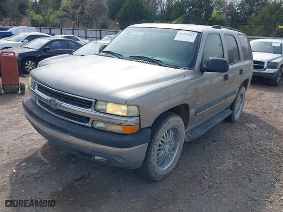 2003 Chevrolet Tahoe LS with VIN 1GNEC13V03R272663, listed as a IAAI auction lot 41933407 with 245,113 mi miles. Bid and sale history available at carsss.com. Image 2.