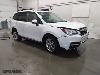 2018 Subaru Forester Touring with VIN JF2SJAWC8JH463943, listed as a IAAI auction lot 41611230 with 65,444 mi miles. Bid and sale history available at carsss.com. Image 1.