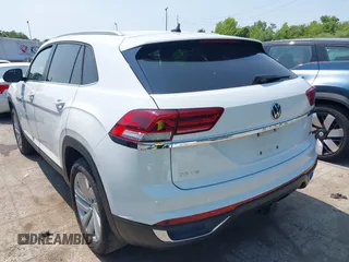 2022 Volkswagen Atlas SE z VIN 1V2HE2CA5NC225233, wystawiony jako IAAI lot #42366811 z przebiegiem 27 986 mil mil oraz . Historia ofert i sprzedaży dostępna na DreamBid. Obrazek 3.