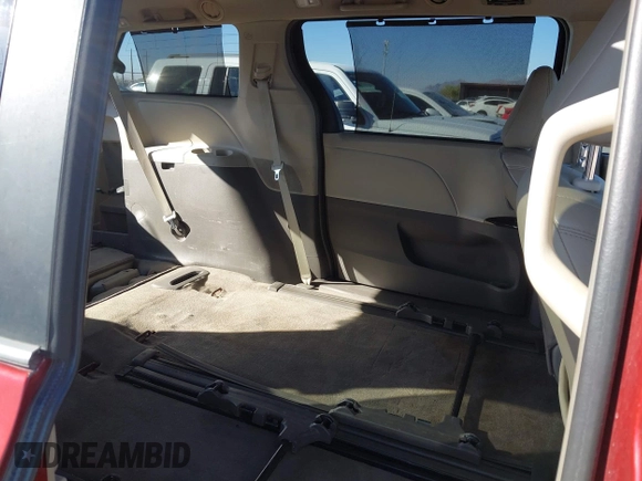 2015 Toyota Sienna XLE with VIN 5TDYK3DCXFS621190, listed as a IAAI auction lot 41646481 with 173,817 mi miles. Bid and sale history available at carsss.com. Image 8.