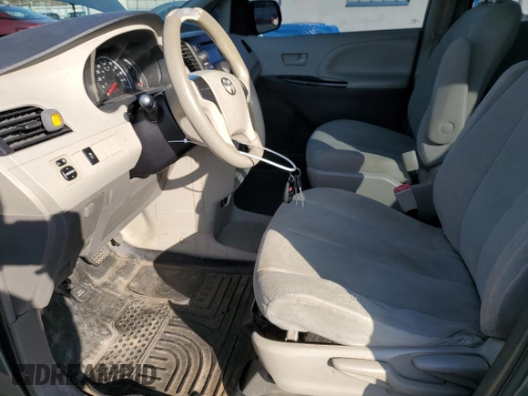 2014 Toyota Sienna L with VIN 5TDZK3DC4ES498196, listed as a Copart auction lot 50214285 with 239,718 mi miles and Clean Title. Bid and sale history available at carsss.com. Image 7.
