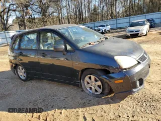 2006 Suzuki Aerio Premium z VIN JS2RC62HX65351200, wystawiony jako Copart lot #88077405 z przebiegiem 165 431 mil mil oraz Szkoda całkowita • Salvage title. Historia ofert i sprzedaży dostępna na DreamBid. Obrazek 4.