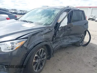 2016 Mazda CX-5 Grand Touring with VIN JM3KE4DY9G0845707, listed as a IAAI auction lot 41709685 with 96,351 mi miles. Bid and sale history available at carsss.com. Image 6.