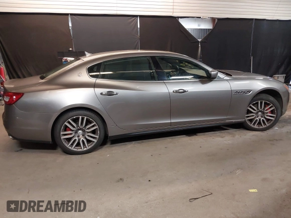 2015 Maserati Quattroporte S Q4 z VIN ZAM56RRAXF1158381, wystawiony jako IAAI lot #39717772 z przebiegiem 100 836 mil mil oraz . Historia ofert i sprzedaży dostępna na DreamBid. Obrazek 14.