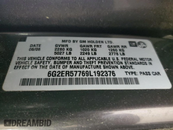 2009 Pontiac G8 z VIN 6G2ER57769L192376, wystawiony jako Copart lot #58634365 z przebiegiem 206 095 mil mil oraz Tytuł czysty. Historia ofert i sprzedaży dostępna na DreamBid. Obrazek 13.