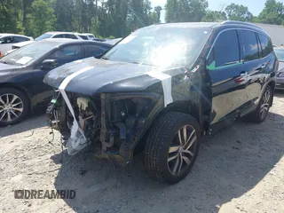 2017 Honda Pilot Touring с VIN 5FNYF5H9XHB024868, выставлен на аукционе IAAI как лот 42300608 с пробегом 133 018 миль миль и . История ставок и продаж доступна на DreamBid. Изображение 23.
