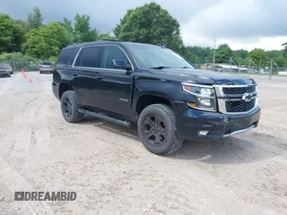 2019 Chevrolet Tahoe LT with VIN 1GNSKBKC8KR250551, listed as a IAAI auction lot 42705331 with 126,430 mi miles and . Bid and sale history available at DreamBid. Image 1.