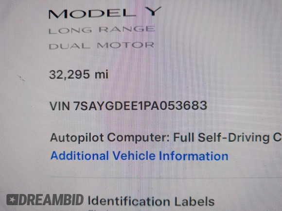 2023 Tesla Model Y Long Range with VIN 7SAYGDEE1PA053683, listed as a IAAI auction lot 42124517 with 32,295 mi miles. Bid and sale history available at carsss.com. Image 9.