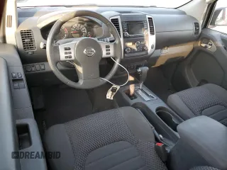 2015 Nissan Frontier SV with VIN 1N6AD0CUXFN766687, listed as a Copart auction lot 57445095 with 65,525 mi miles and Salvage title. Bid and sale history available at DreamBid. Image 8.